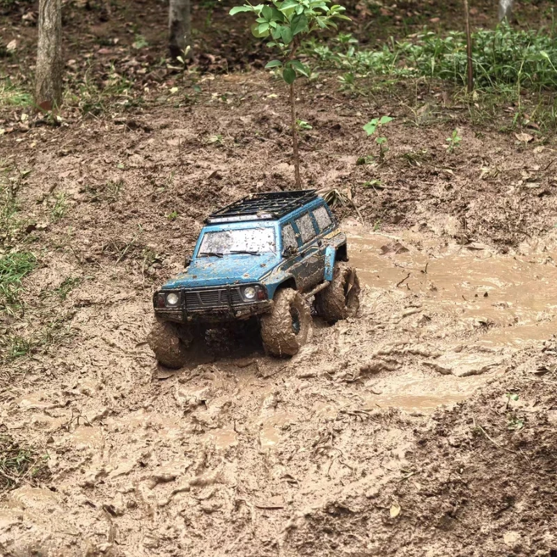 

Yikong YK4107 1/10 Scale Remote Control Car 4WD Dual Speed Off-Road Climbing Vehicle Simulation Toy Gift for Ages 14+