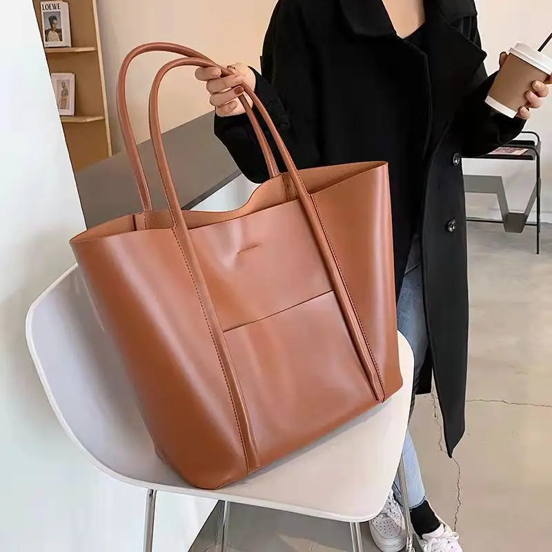 

Genuine Leather Large Capacity Tote Bag For Women New Fashionable And Casual Cowhide Commuting Bag High-End Feeling Bag For Wome