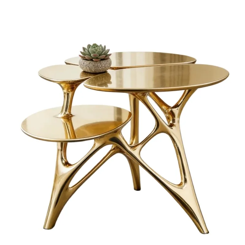 Luxurious polished golden multi-layer side table, featuring an organic design, suitable for high-end home and hotel decoration.