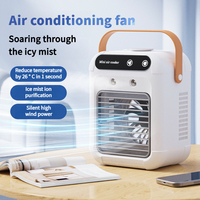 New USB small desktop air cooler mini electric fan with handle two speed adjustable mute spray cooling humidification fan.