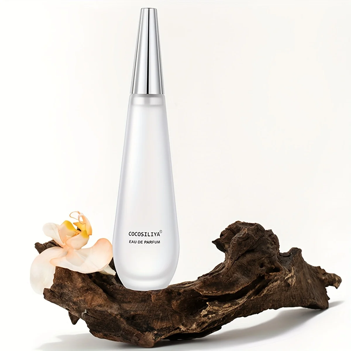 

Classic Perfume Teardrop Shaped Eau De Parfum Silver Spired Cap Elegant Minimalist Softly Refreshing Long Lasting Fragrance