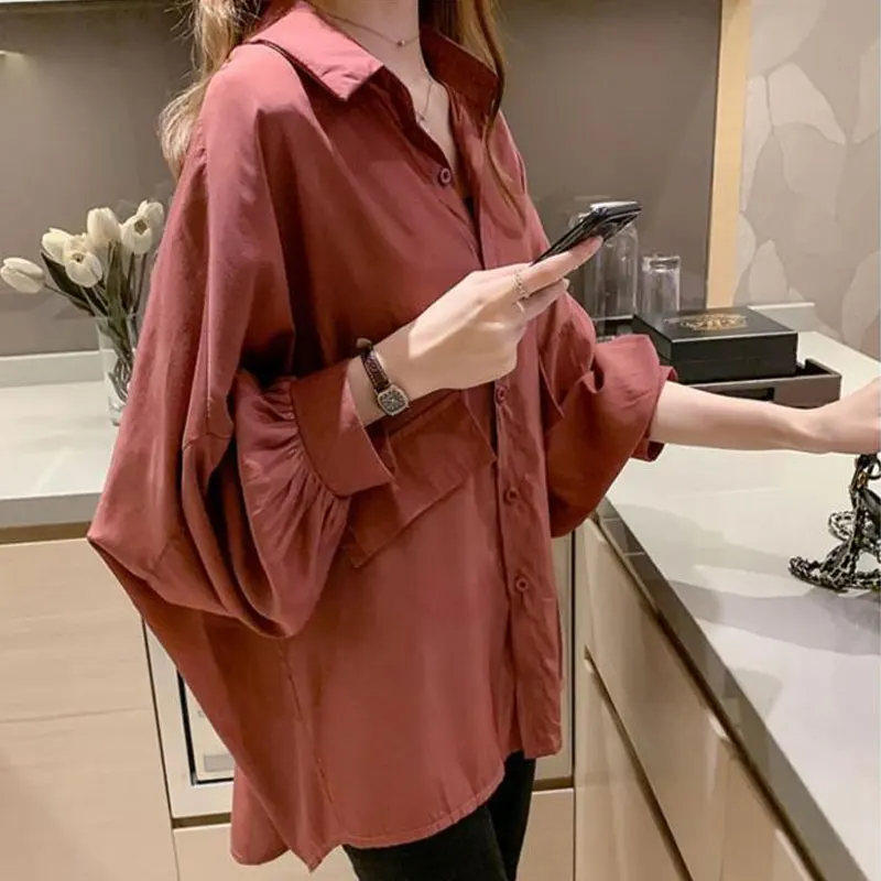 Koreanische lose einfarbige Bluse Frühling Herbst neuer Turn-Down-Kragen lässig einreihig Patchwork Frauen pendeln Midi-Shirt