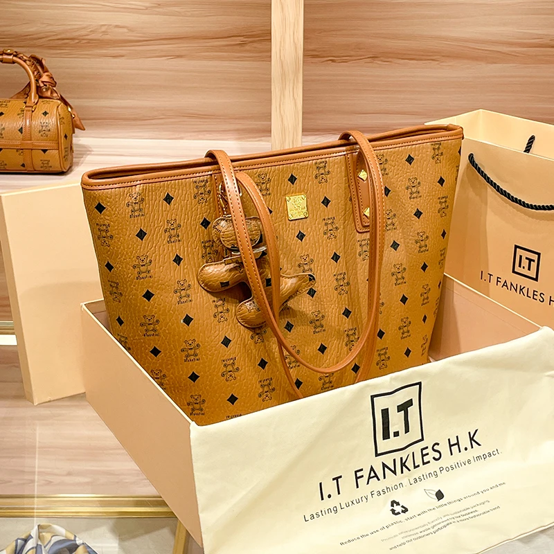 

Leather tote bag, new spring and summer large-capacity portable fashion shoulder bag.