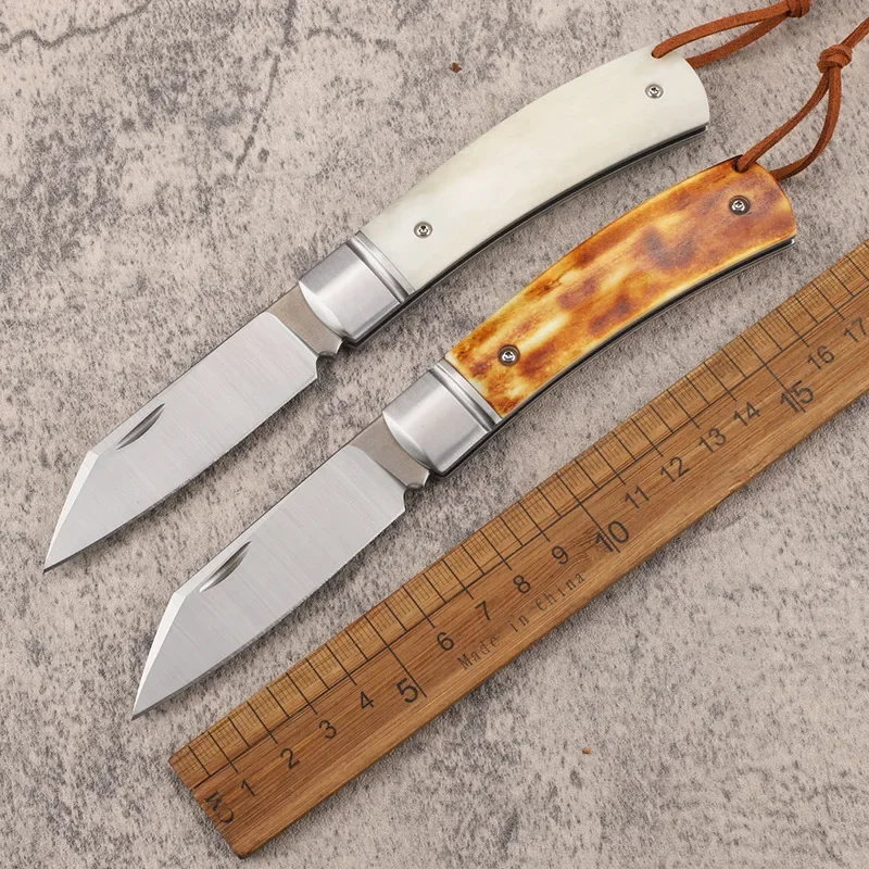 

Yellow / White Cow Bone Folding Blade Knife D2 Steel Outdoor Camping Portable Pocket Knifes Hand Tools With Gift Box 60-62HRC