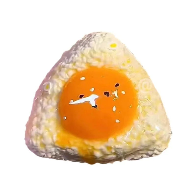 صفار البيض وكرات أرز السمسم مع نسيج هريس يخفف التوتر، ويرتد ببطء الظهر، وهي هدايا ممتعة للقرص #2