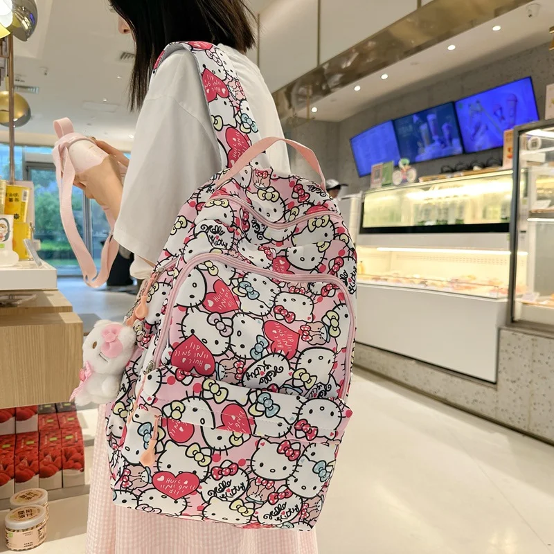 Sanrio Hello Kitty cute and sweet student schoolbag cartoon printing simple and light shopping trip large capacity backpack