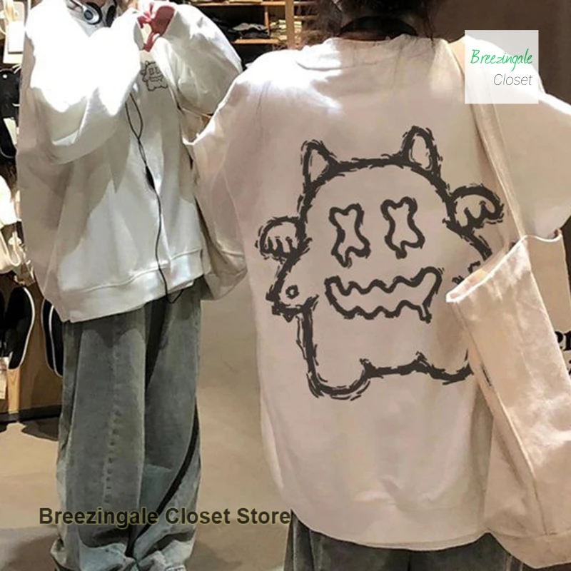 American-style cartoon little devil pattern hooded sweater white coat female spring and autumn loose fashion Joker casual top.