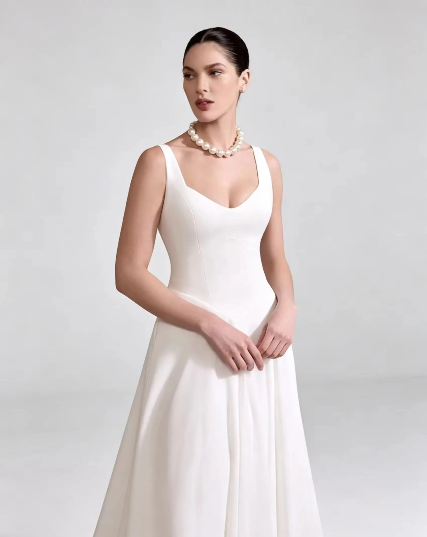 Customized Fashion Sweetheart Sleeveless Spaghetti Strap Wedding Dress Elegant A-line Open Back Draped Floor Length Bridal Gowns