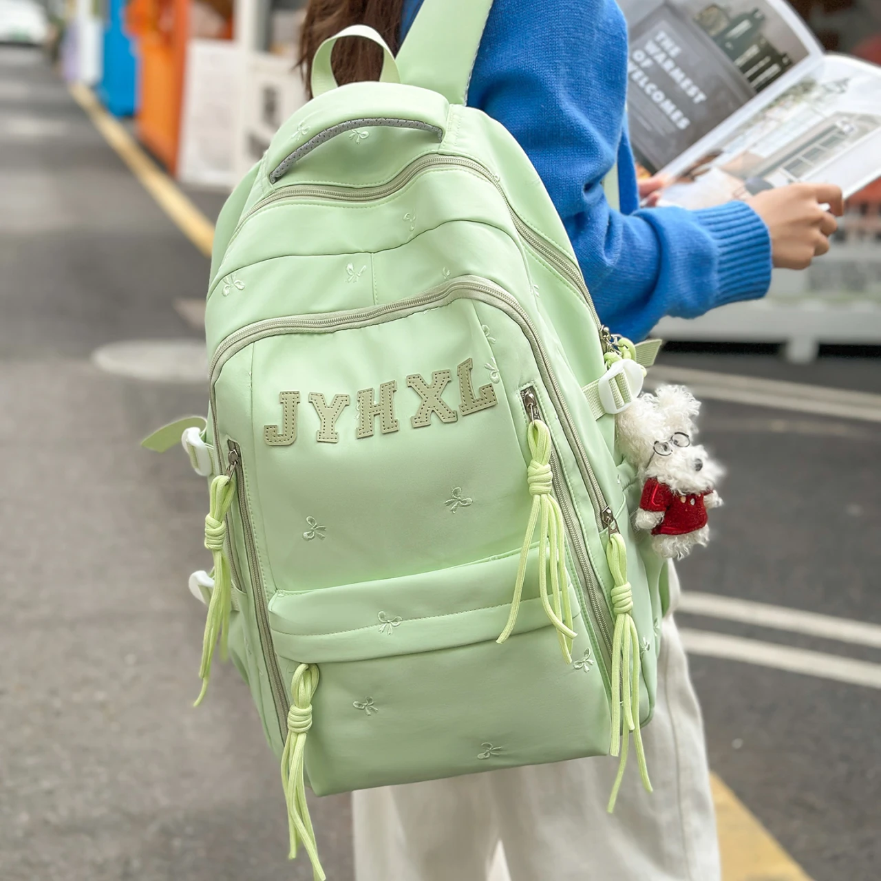 

Women's Backpack Letter Embroidery Tassel Charm Multi Pocket Adjustable Strap Casual Daily School Travel Bag 2026 New Back Pack