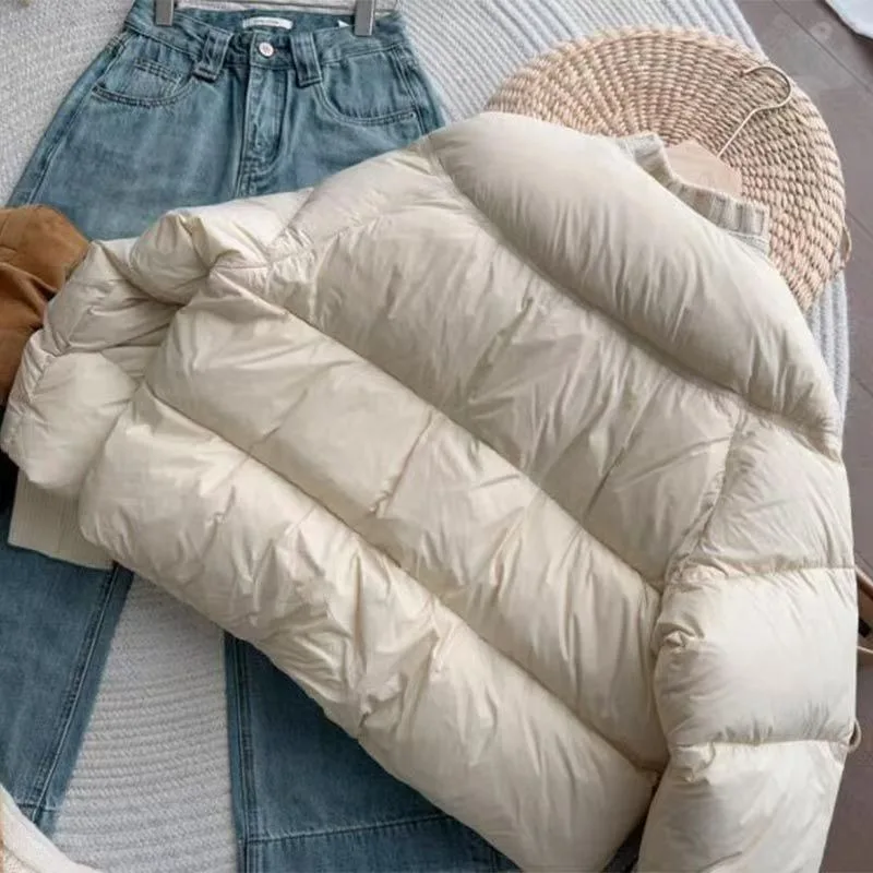Plain round-neck knitted paneled coat for women thick and warm winter design minimalist style outerwear padded jacket