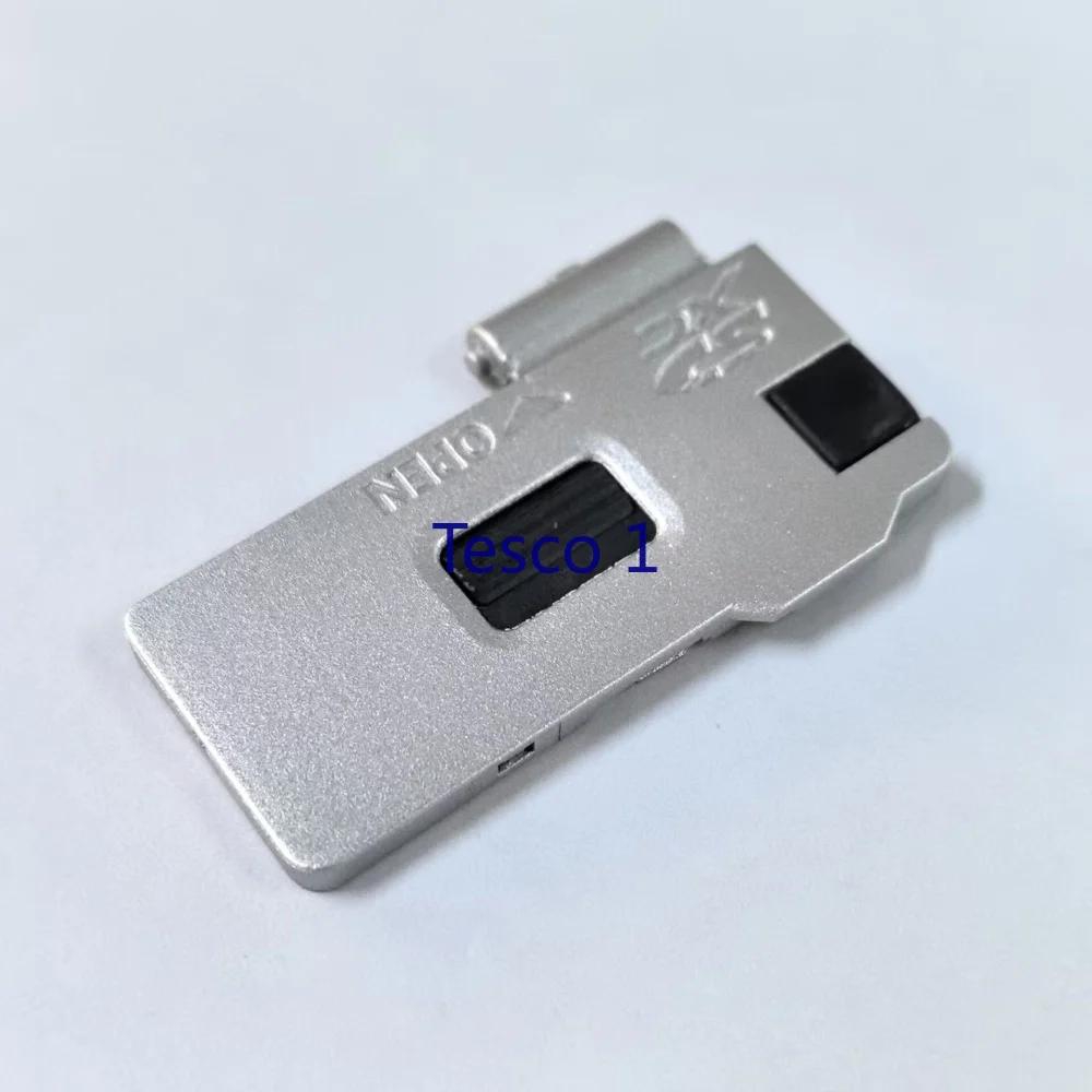 جديد (فضي) لأوليمبوس EM10II EM10III EM10 Mark II EM10 Mark III غطاء باب البطارية المتين غطاء غطاء كاميرا رقمية جزء