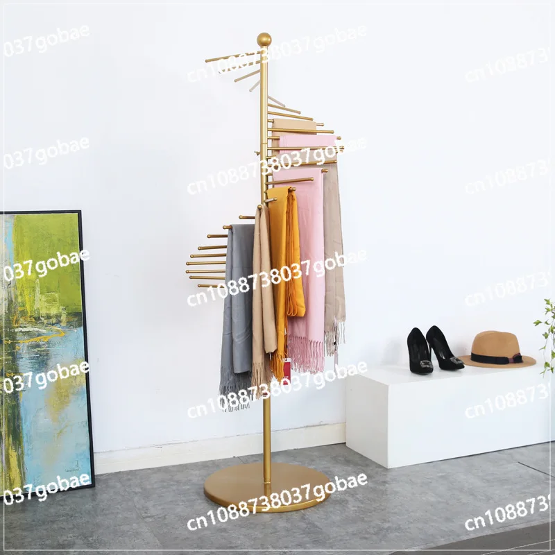 Wrought iron towels, clothes, golden scarves, shelves, floor displays
