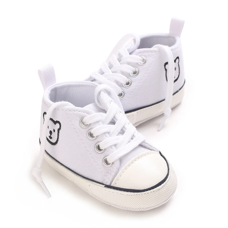 أحذية أطفال كلاسيكية على الموضة أحذية كاجوال أحذية تعميد بنعل ناعم للأولاد والبنات أحذية رياضية مريحة للمشي الأول من عمر 0 إلى 18 شهرًا