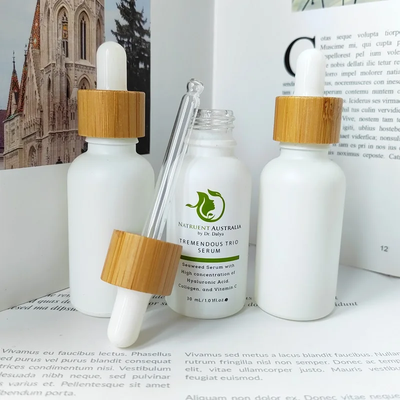 110Pcs Fashion 1 OZ Frosted White Glass Cosmetic Packaging Serum Dropper Bottle with Bamboo Cap Empty Liquid Dispenser Bottle CN