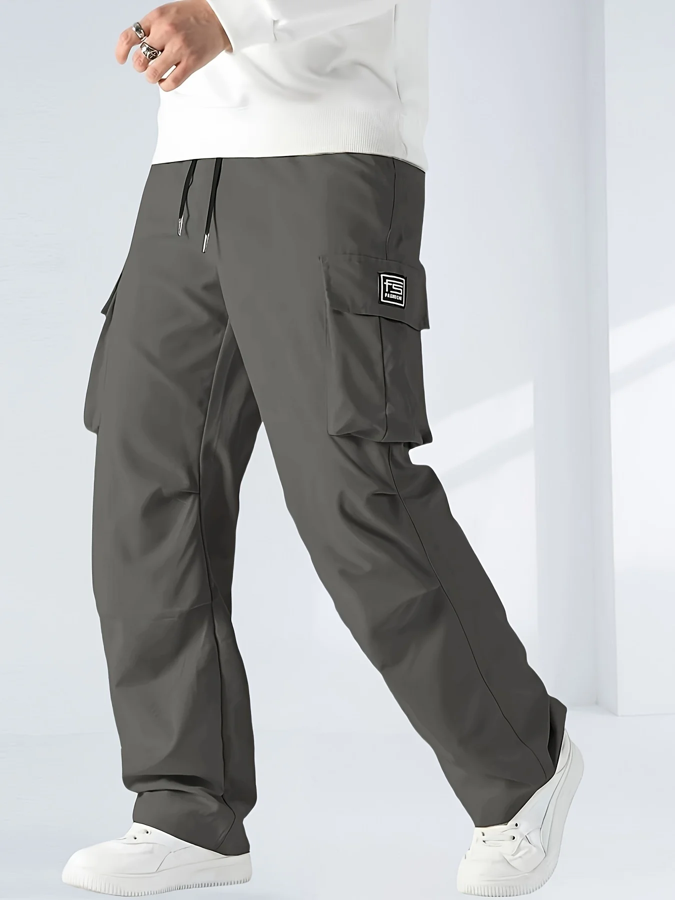 Pantalon cargo homme printemps-automne coupe ample taille à cordon multi-poches streetwear décontracté long style hip-hop tendance 2026