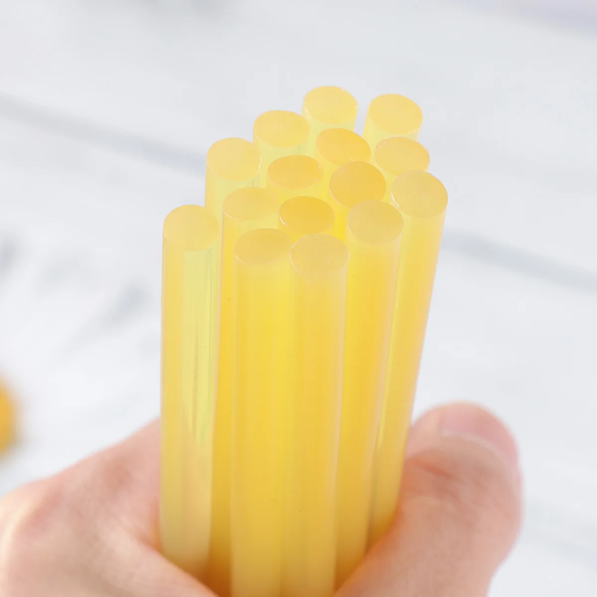 

100Pcs Hot Melt Glue Sticks Strong Adhesive Glue Strips Cuttable Glue Sticks for Home Shop Store (Yellow)