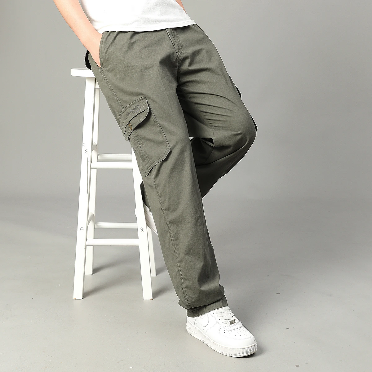 القطن جيب كبير السراويل البضائع الرجال العمل العسكري السراويل مع جيوب متعددة كبيرة وطويلة ملابس خارجية حجم كبير السراويل فضفاضة تناسب