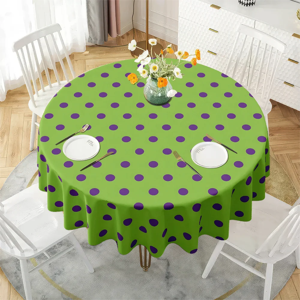 One simple polka dot round tablecloth. Green base with purple dots. Fashionable design for home dining table decoration.zyc