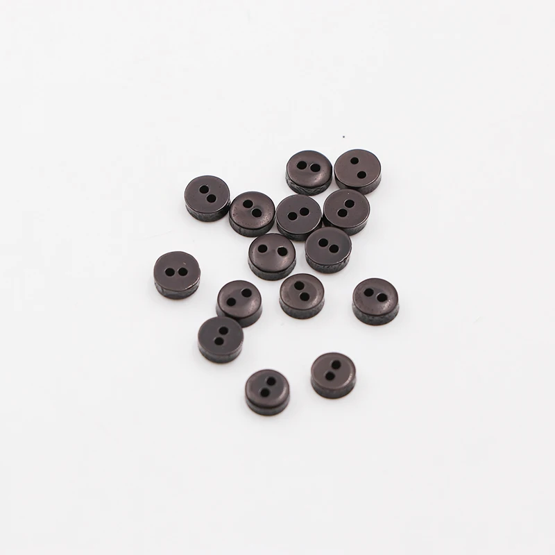 DoreenBeads bottoni Scrapbooking per cucire in resina rotondi neri 2 fori diametro 6mm( 2/8 \