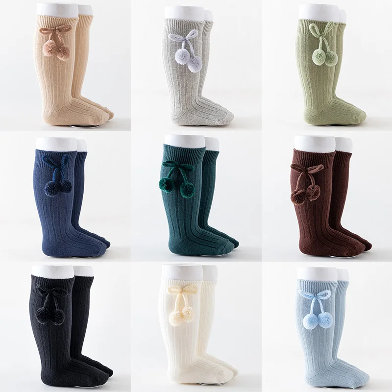 

Детские носки, однотонные хлопковые мягкие длинные носки принцессы с милым декором из помпона и банта для мальчиков и девочек, эластичные теплые уютные повседневные носки, чулки
