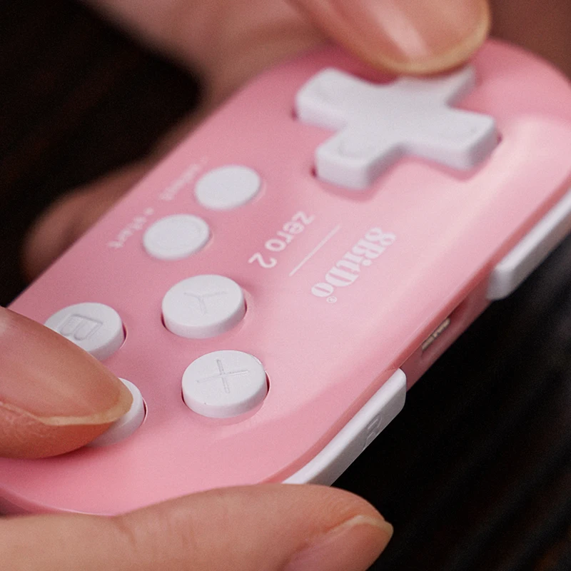 8Bitdo Zero2 Mini Gamepad سماعة لاسلكية تعمل بالبلوتوث عصا التحكم للهواتف أندرويد PC NS Switch أذرع التحكم في ألعاب الفيديو Steam TV Tablet IPad Anki