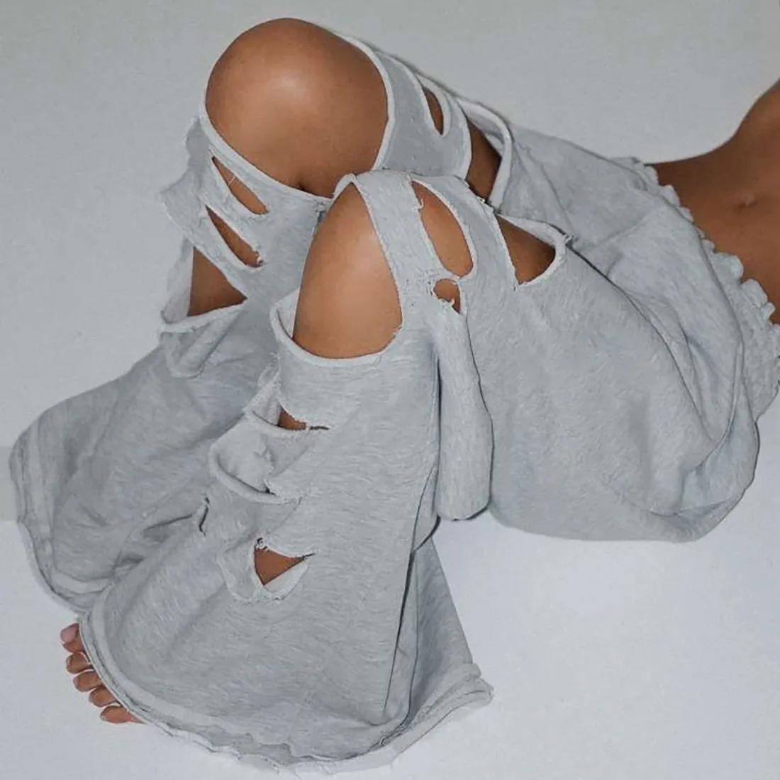 

DSMTRC женские нерегулярные полые дизайны с эластичной резинкой на талии, уличная мода, универсальный стиль, классический низ, повседневные длинные брюки большого размера