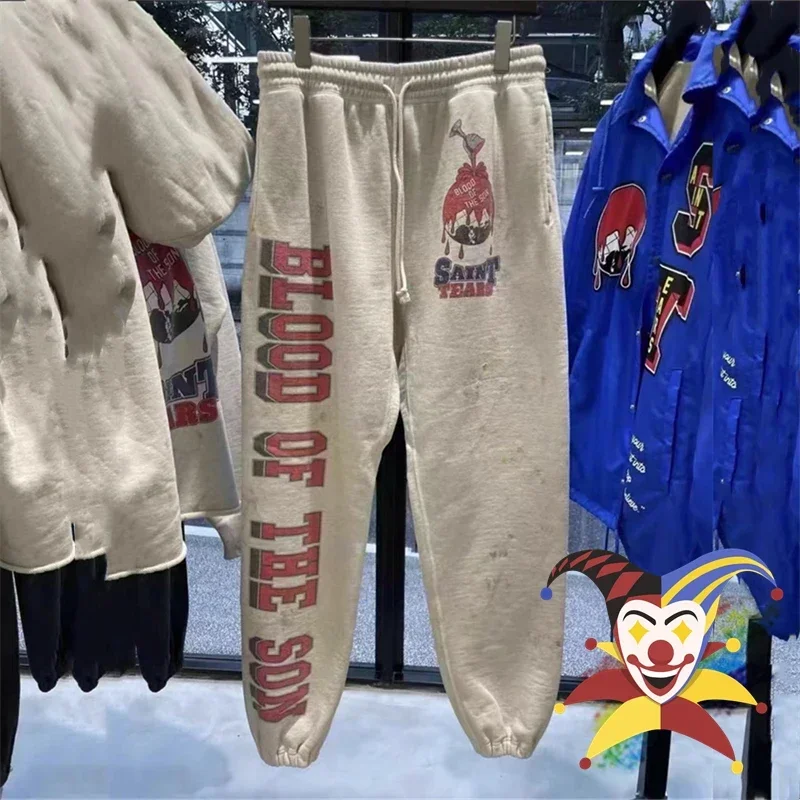 

Брюки спортивные унисекс абрикосового цвета на завязках