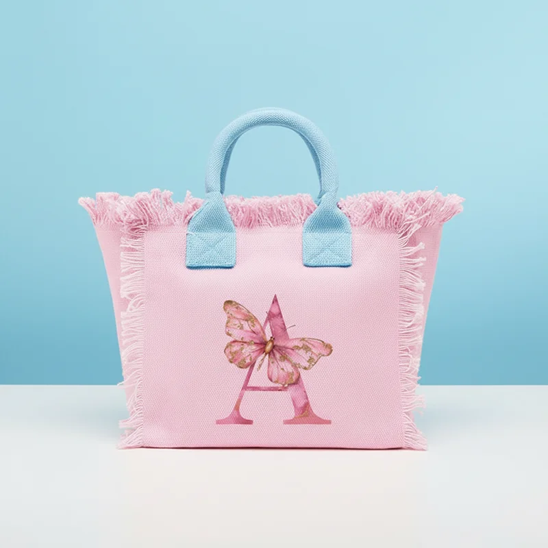 Borsa tote casual da donna in tela rosa e blu con borsa da spiaggia con nappa con stampa di lettere a farfalla, indispensabile per un elegante accessorio da spiaggia
