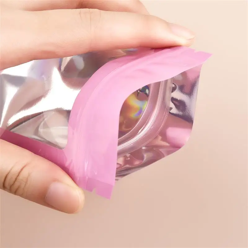 20 ชิ้น Holographic Ziplock กระเป๋าพลาสติกเลเซอร์สีรุ้งซิปกระเป๋าสําหรับเล็บขนตาต่างหูแหวนเครื่องประดับกระเป๋า