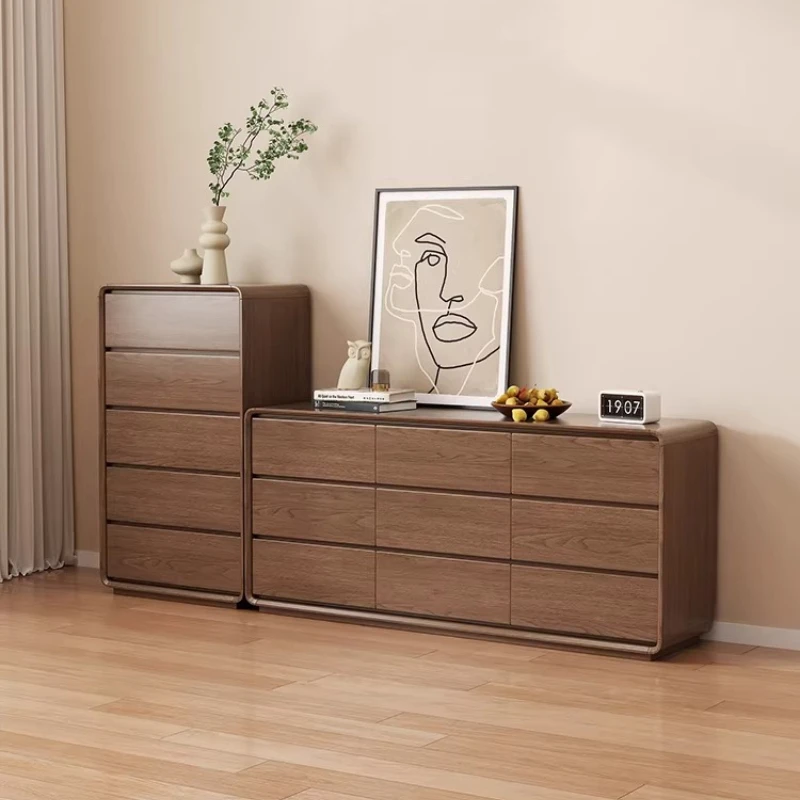 

living room against the wall, master bedroom, 9 buckets at the end of the bed, storage cabinet, chest of drawers, locker
