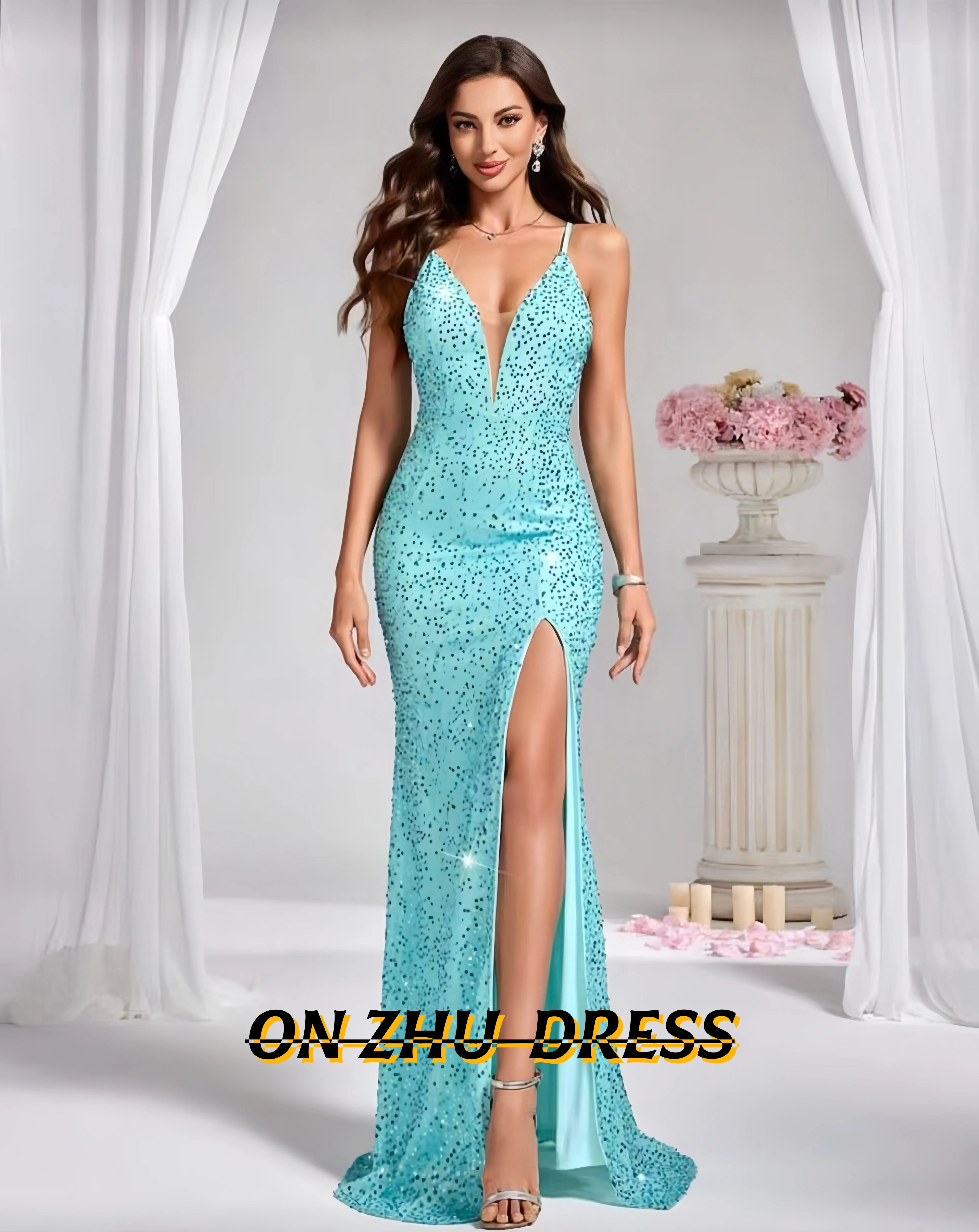 

Customized evening gowns with V-neck and sleeveless design. Women's luxurious evening gowns. Elegant party gowns.