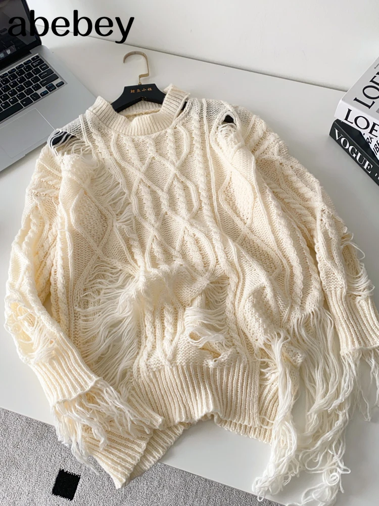 

2026 Women's Loose Fitting Long Sleeved Torn Sweater New Hollow Out Design Lazy Sexy Knitted Sweater Leisure Travel Party Top