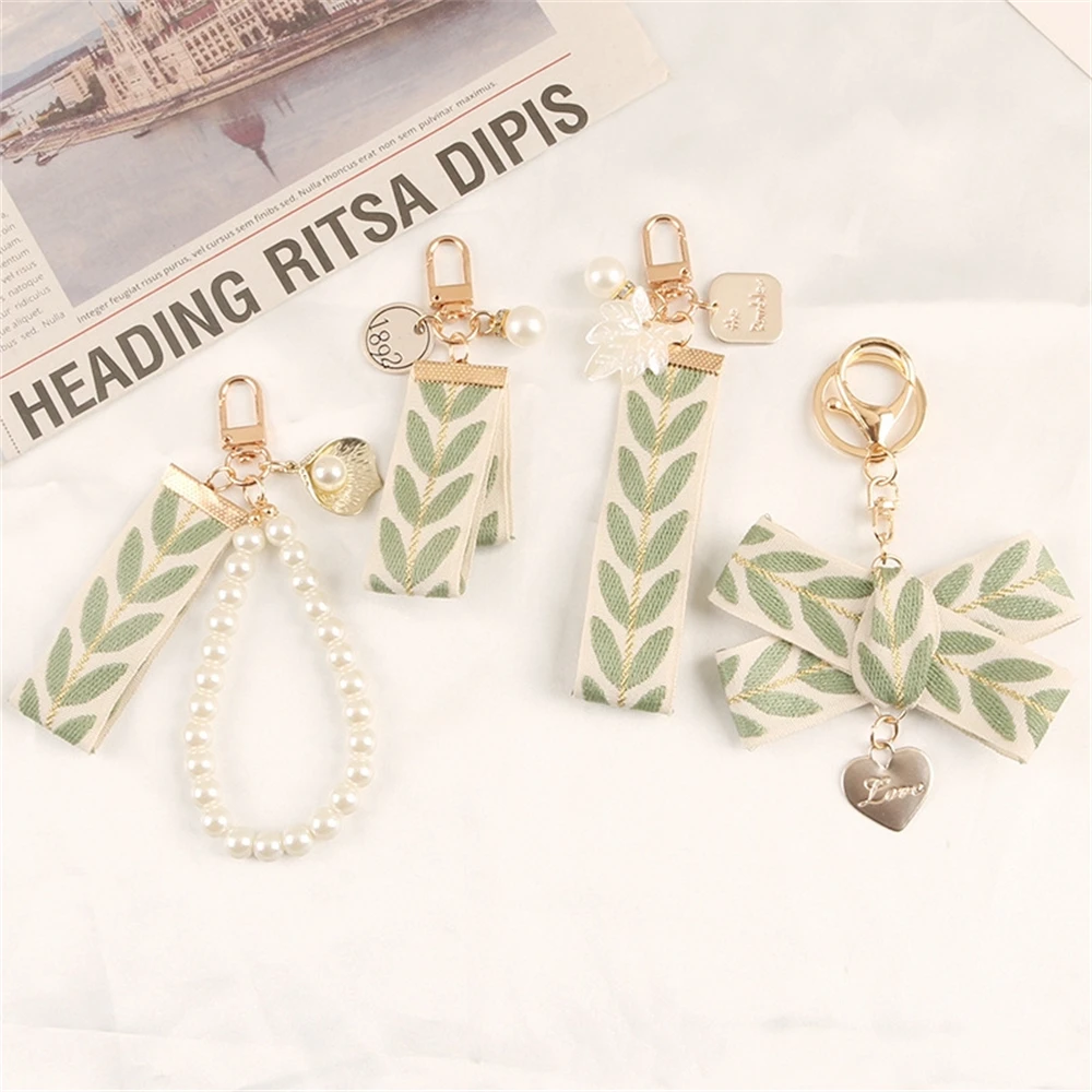 Fashion Leaf Shaped Braided Strap Keychain Pearl Heart Bow Pendant Key Chains Women Bag Charms Ornaments Car Keyring Accessories