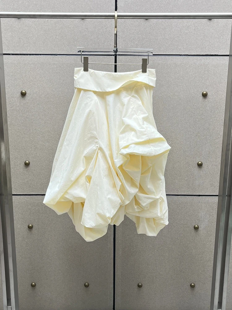 Multi-layered, dimensional, irregular-cut skirt: New high-street pleated women's skirt for Autumn 2026.