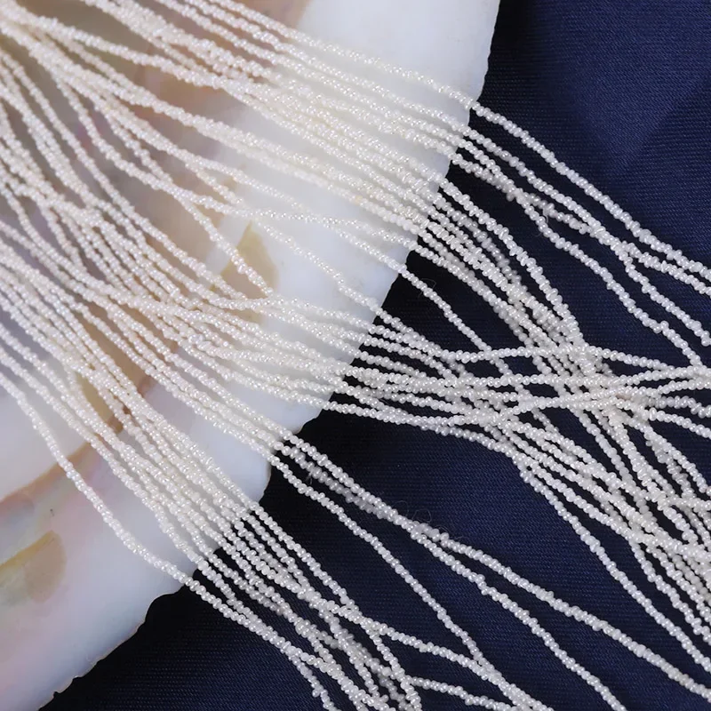 

1-1.25mm white tiny size potato shape cultured freshwater pearl strands for jewelry making