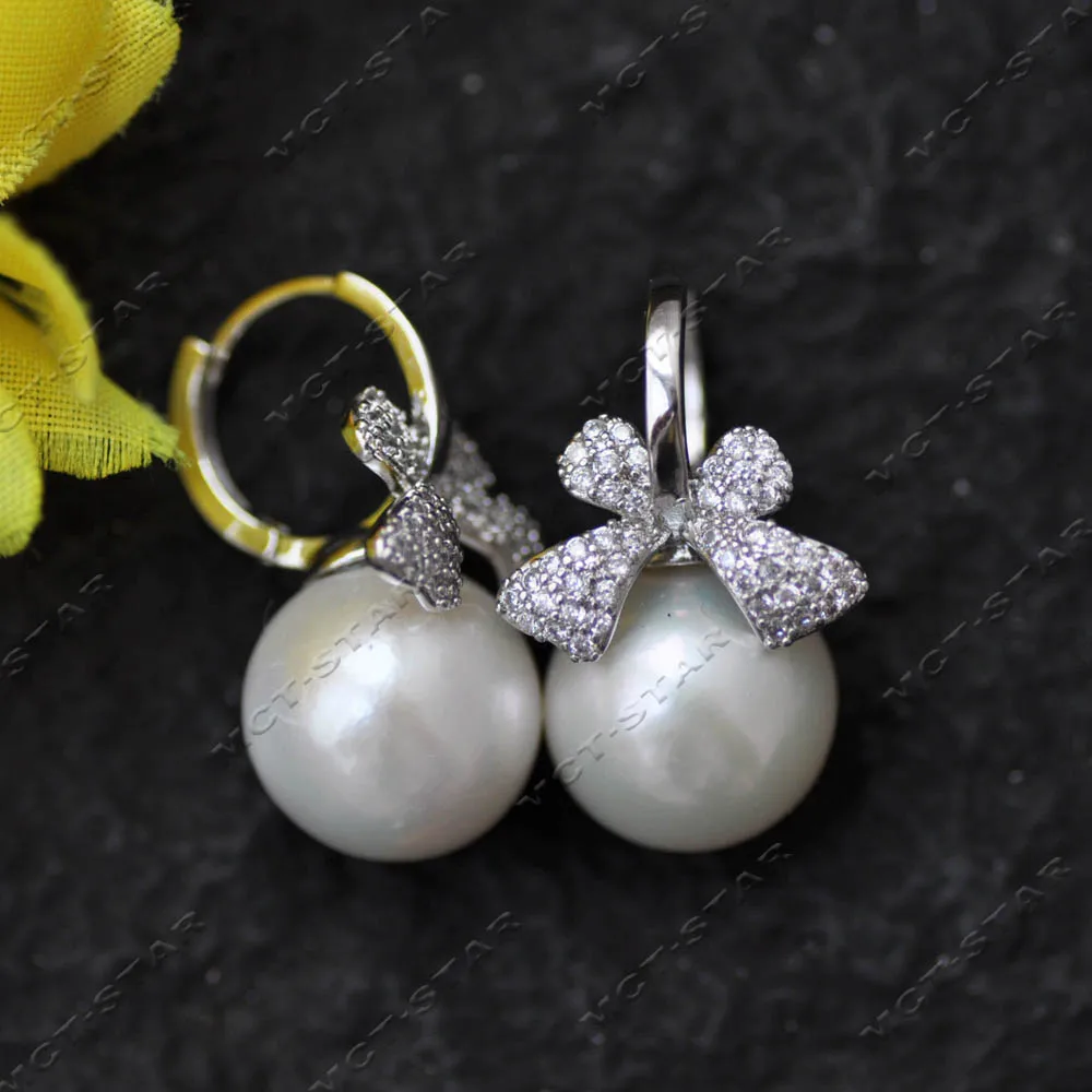 

MTC·STAR A+ 13mm White Round Edison Keshi Pearl All CZ Bowknot Style Earring (Z14556)