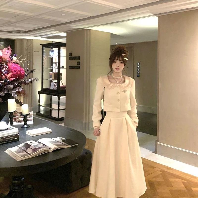 

Осень-зима, новые маленькие ароматные стильные комплекты из двух предметов для кружевной отделки, кукольный воротник, короткое пальто + длинные юбки трапециевидной формы с высокой талией