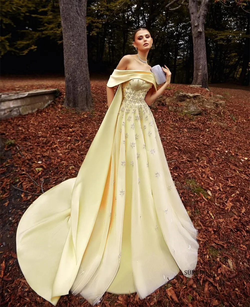 فستان سهرة SUKUHANG عربي أصفر من الساتان الفاخر في دبي على شكل حرف a بدون أكتاف للنساء لحفلات الزفاف حسب الطلب