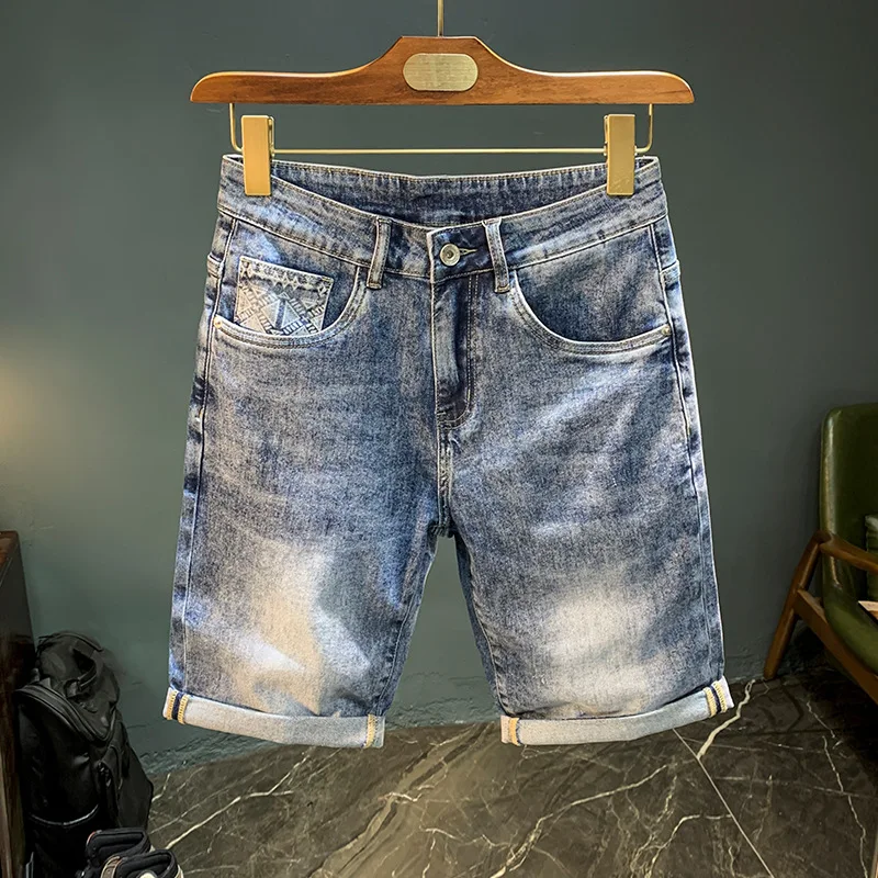 Pantaloncini di jeans da uomo estivi 2024annuale sottili di fascia alta e pantaloni corti dritti stampati alla moda pantaloncini blu Casual di marca di moda