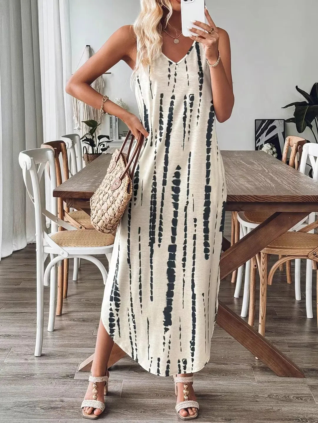 Modieuze vrijetijdsjurk Mouwloze zomerjurk met losse split en print V-hals Kleurblokken Print Mouwloze lange jurk voor dames