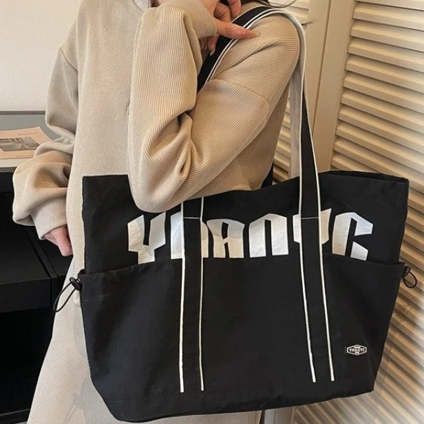 

Женская сумка Canvas 2026: Новая модная сумка через плечо для женщин, трендовая сумка-кроссбоди