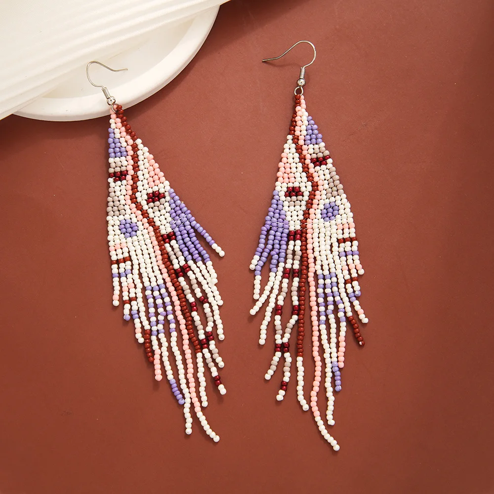 

Rice bead earrings Tassel Colour Originality Design Hand knitting Bohemia Alloy Fashion Simple Beaded earrings