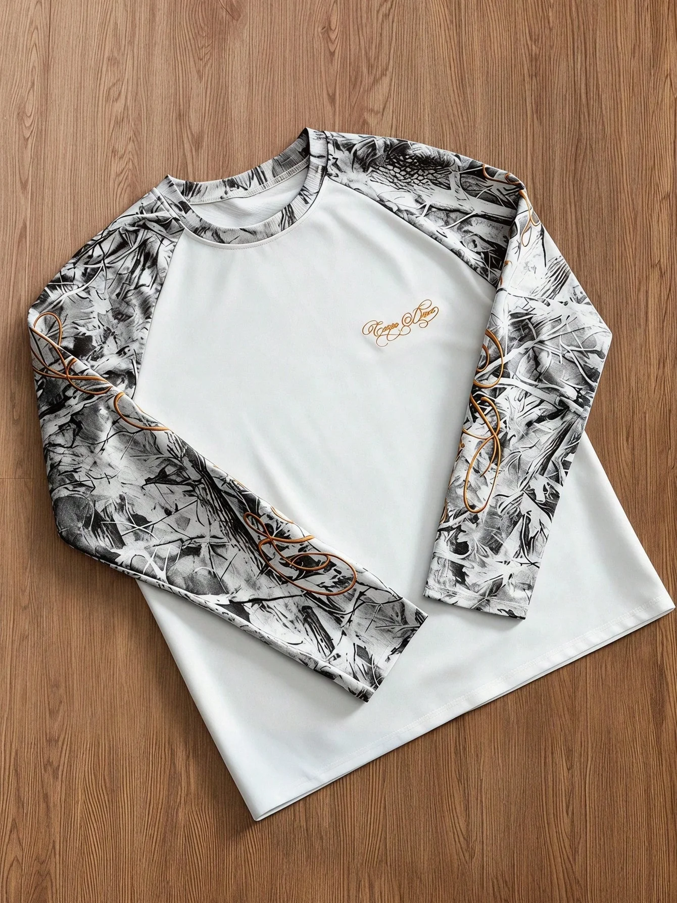 Image of 2026 Sommer Neuer Stil Camouflage-Blätter-Print Raglan-Langarm-T-Shirt Kursivschrift-Grafik Mode Lässige Streetwear Oberteile Kinder