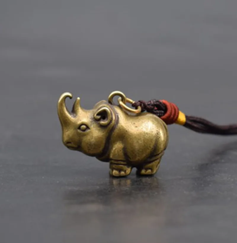 

Mini copper rhinoceros pendant necklace rhinoceros figurine decoration figurine key chain pendant children's toy gift
