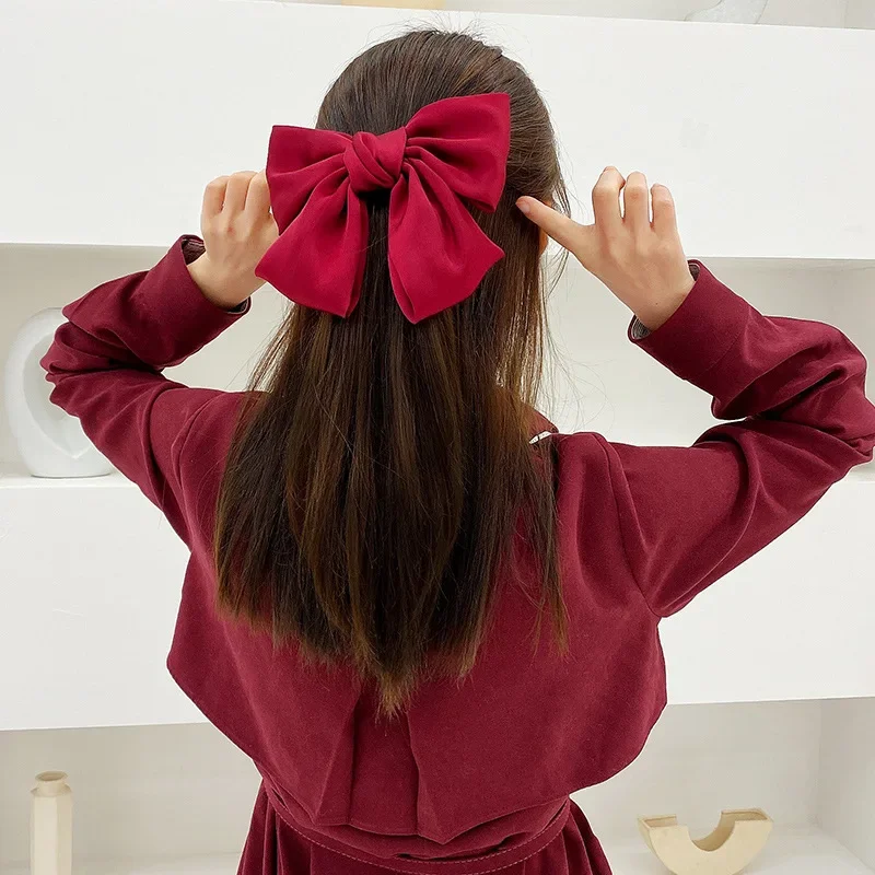 

Big Bow with Red Hair Clip on Back of Head