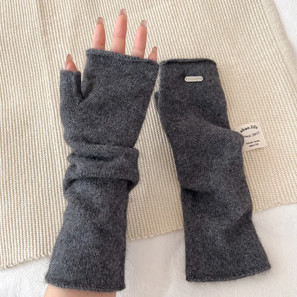 Mode Einfarbig Lange Fingerlose Handschuhe Weiche Gestrickte Frauen Handschuh Metall Label Arm Wärmer Mädchen