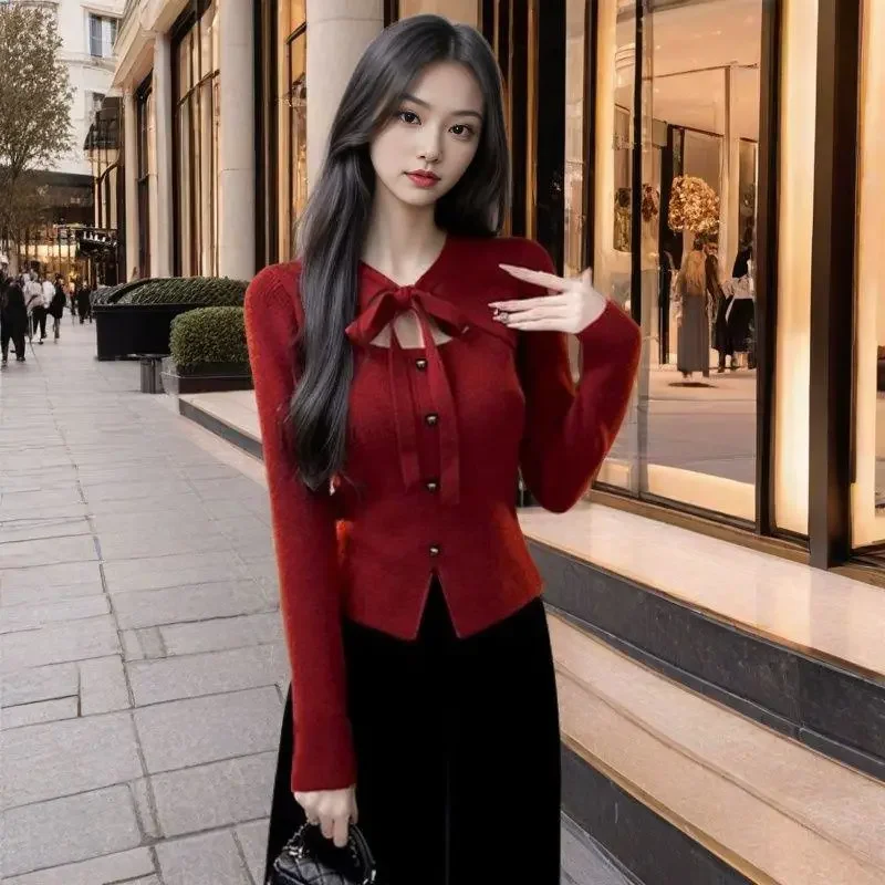 女性のクリスマス衣装ボウニットトップ新しい秋冬レッドセーターインナーウェアフェイクツーピースフィットトップ