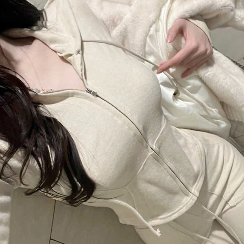 ชุดเซ็ตเสื้อฮู้ดและกางเกงขายาวสไตล์เกาหลีลำลองเซ็กซี่สำหรับผู้หญิง ทรงเข้ารูป แขนยาว ซิปปิด