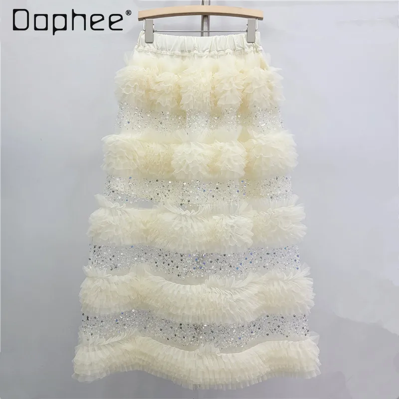 

2026 Ранняя весна, новая элегантная полуюбка в сказочном стиле, эластичная талия, сетчатая юбка с рюшами и пайетками, женская мода, тонкие длинные юбки
