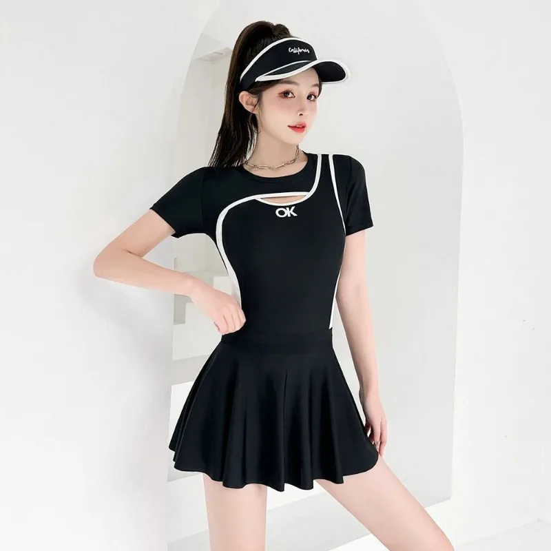 New Women's Short Sleeved Swimming Skirt Hollow Top Black and White Patchwork Swimsuit Suitable for Beaches and Swimming Pools